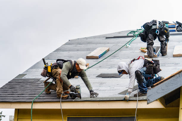 Professional Gutter Installation technician working in Pineville, PA